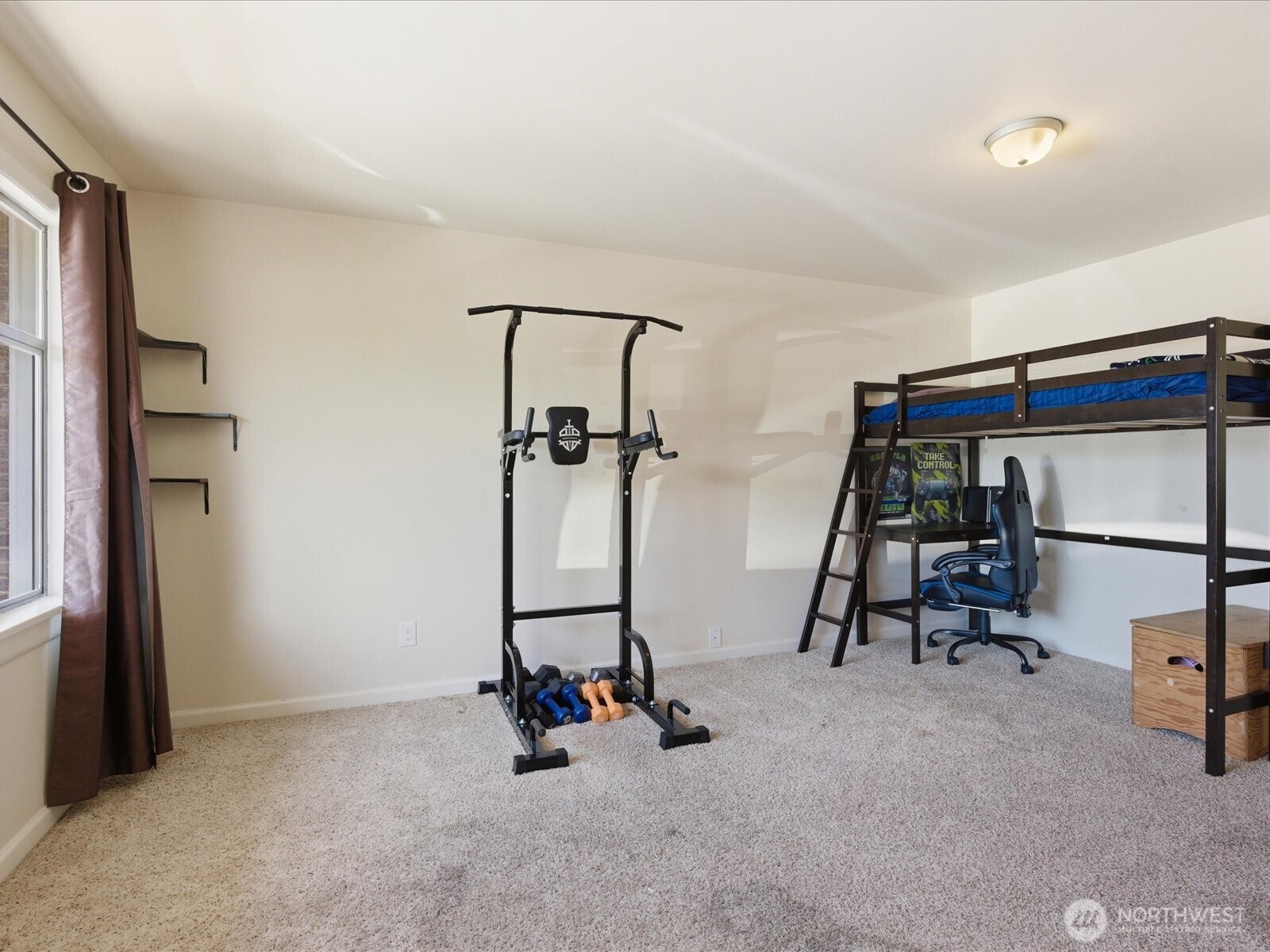 1417 Maple Street Sumner, WA 98390 - Photo 34 of 40 a view of a room with gym equipment