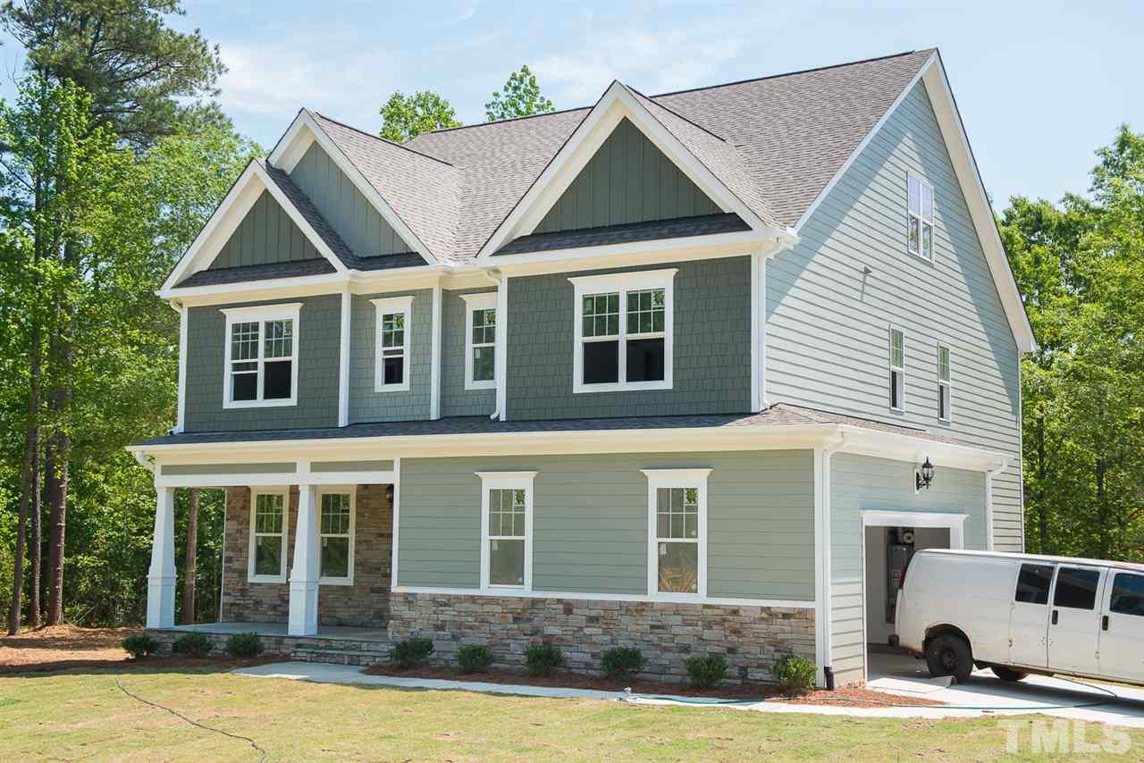 a view of a house with a swimming pool