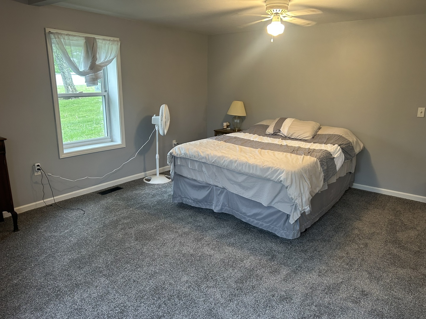 1 Bushwack Road Golconda, IL 62938 - Photo 29 of 38 a spacious bedroom with a bed and a window