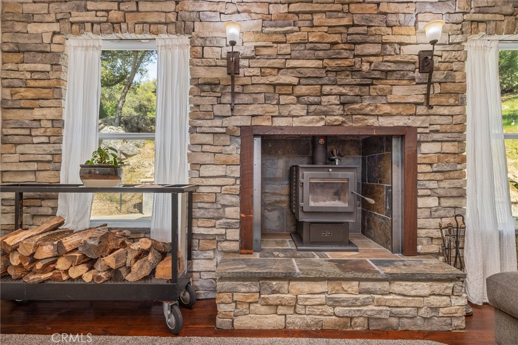 36919 Deer Path Circle Coarsegold, CA 93614 - Photo 11 of 59 a front view of a house with stairs