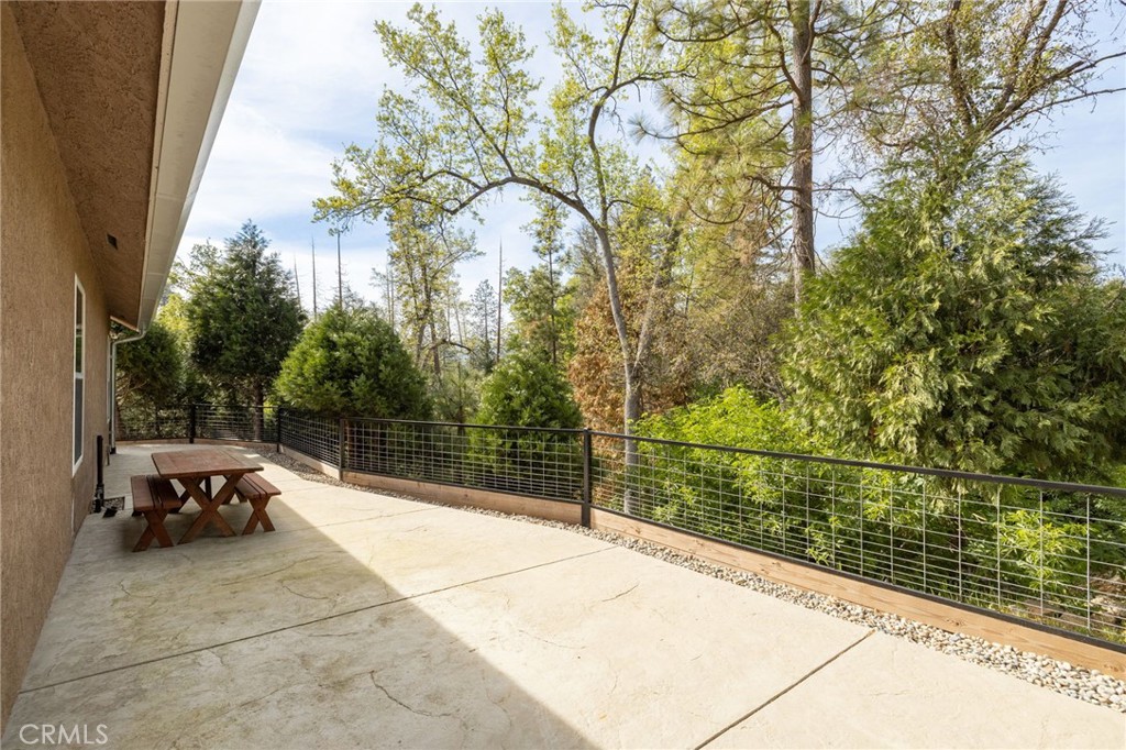 36919 Deer Path Circle Coarsegold, CA 93614 - Photo 38 of 59 a view of a terrace with a bench
