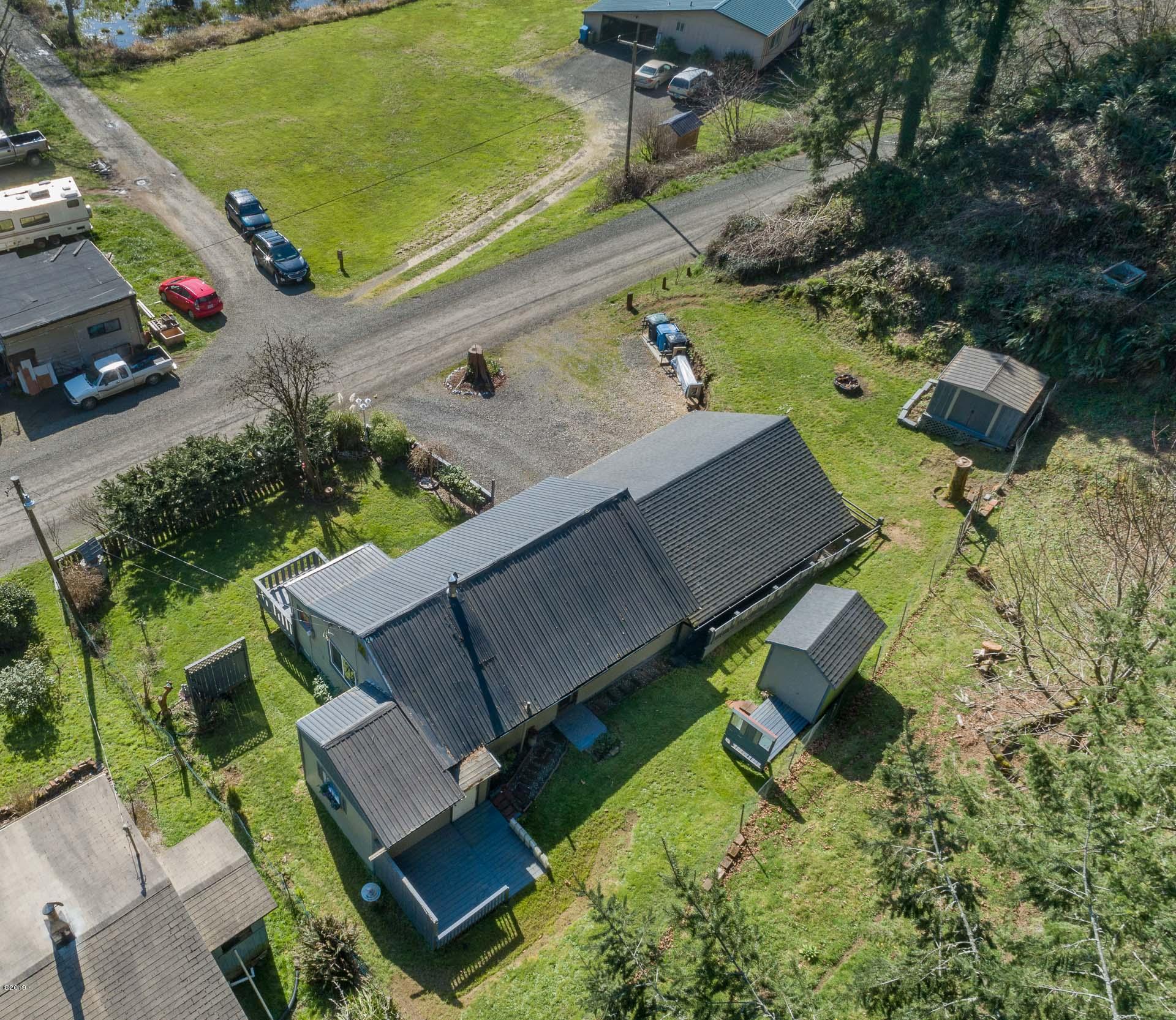 1346 Hidden Valley Road Newport, OR 97365 - Photo 4 of 23 Aerial view of back of home