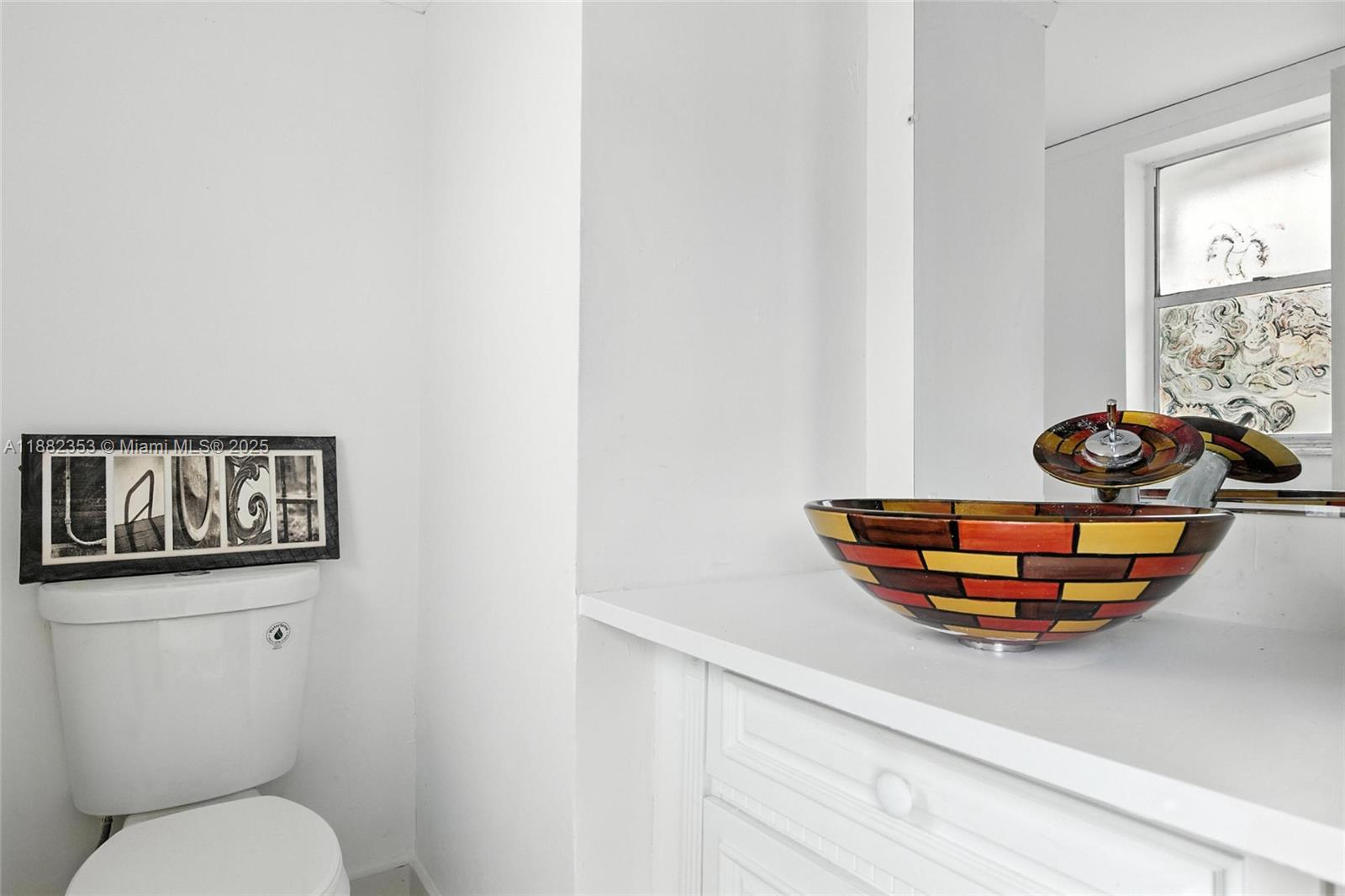 4165 Southwest 66th Terrace, Unit 109 Davie, FL 33314 - Photo 3 of 31 a room with table and a mirror