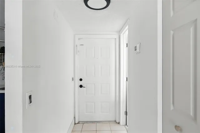 a bathroom with a granite countertop shower