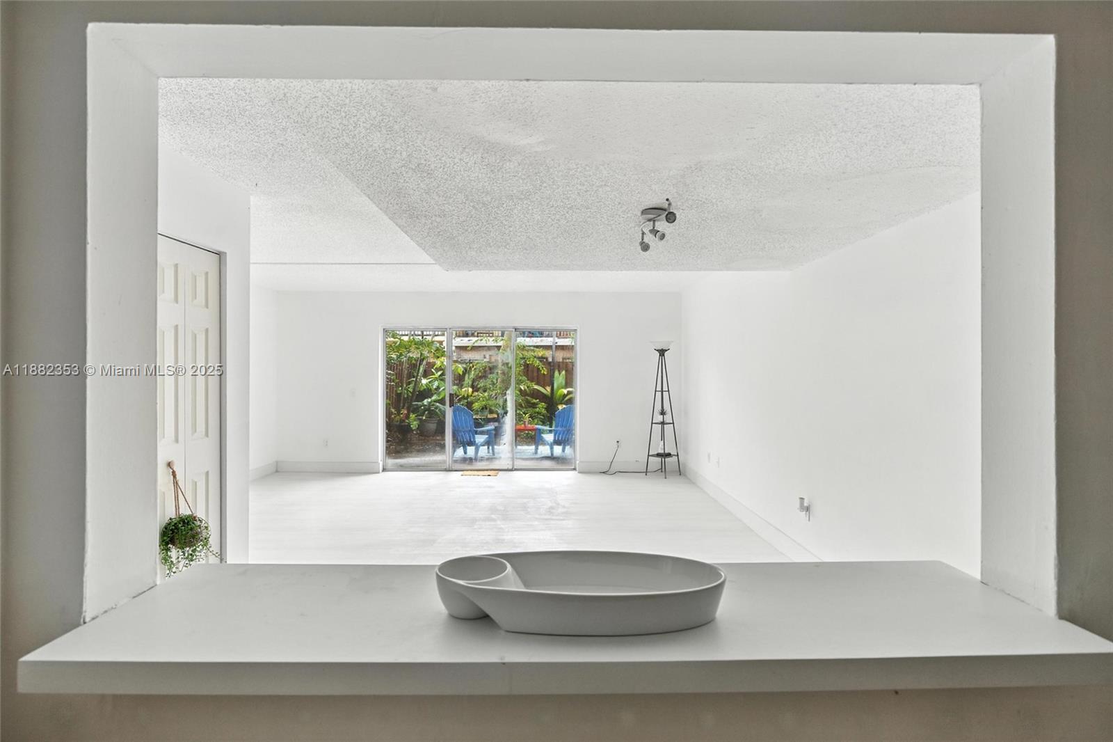 4165 Southwest 66th Terrace, Unit 109 Davie, FL 33314 - Photo 7 of 31 a bathroom with a bathtub and window