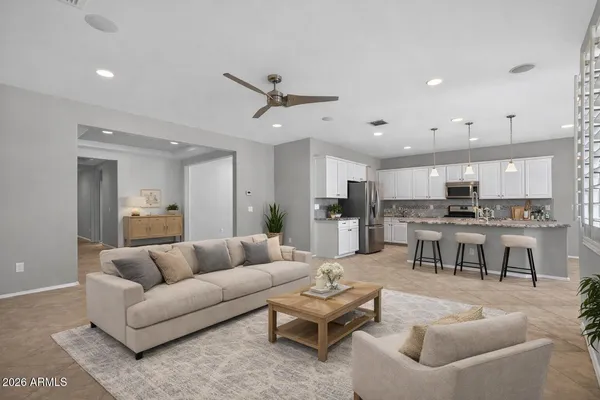 a view of an empty room and a bathroom