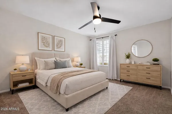 a bathroom with a sink a tub and a mirror