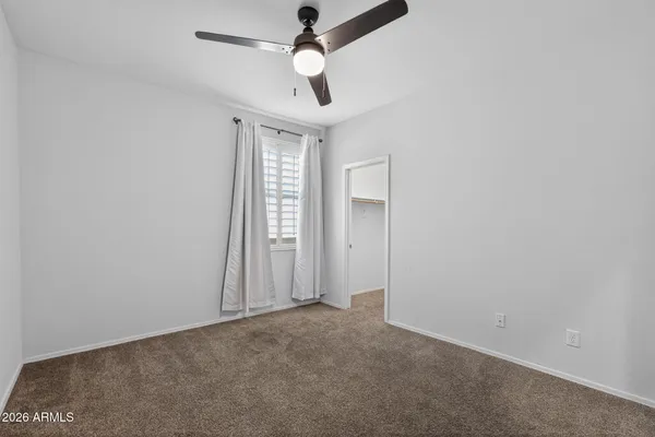 a view of an empty walk in closet