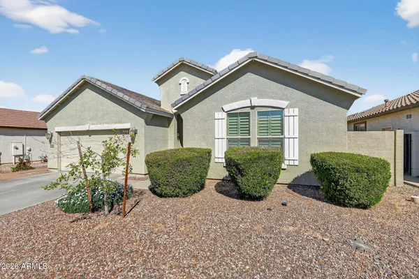 a view of an empty room and a window