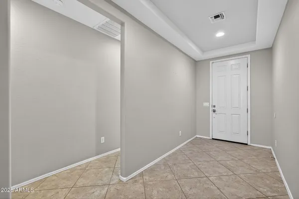 a kitchen with granite countertop a sink stainless steel appliances and cabinets