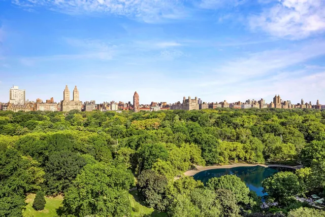 a bathroom with a sink mirror and toilet