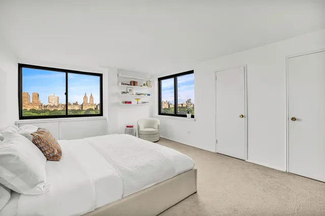 a workspace with furniture and window