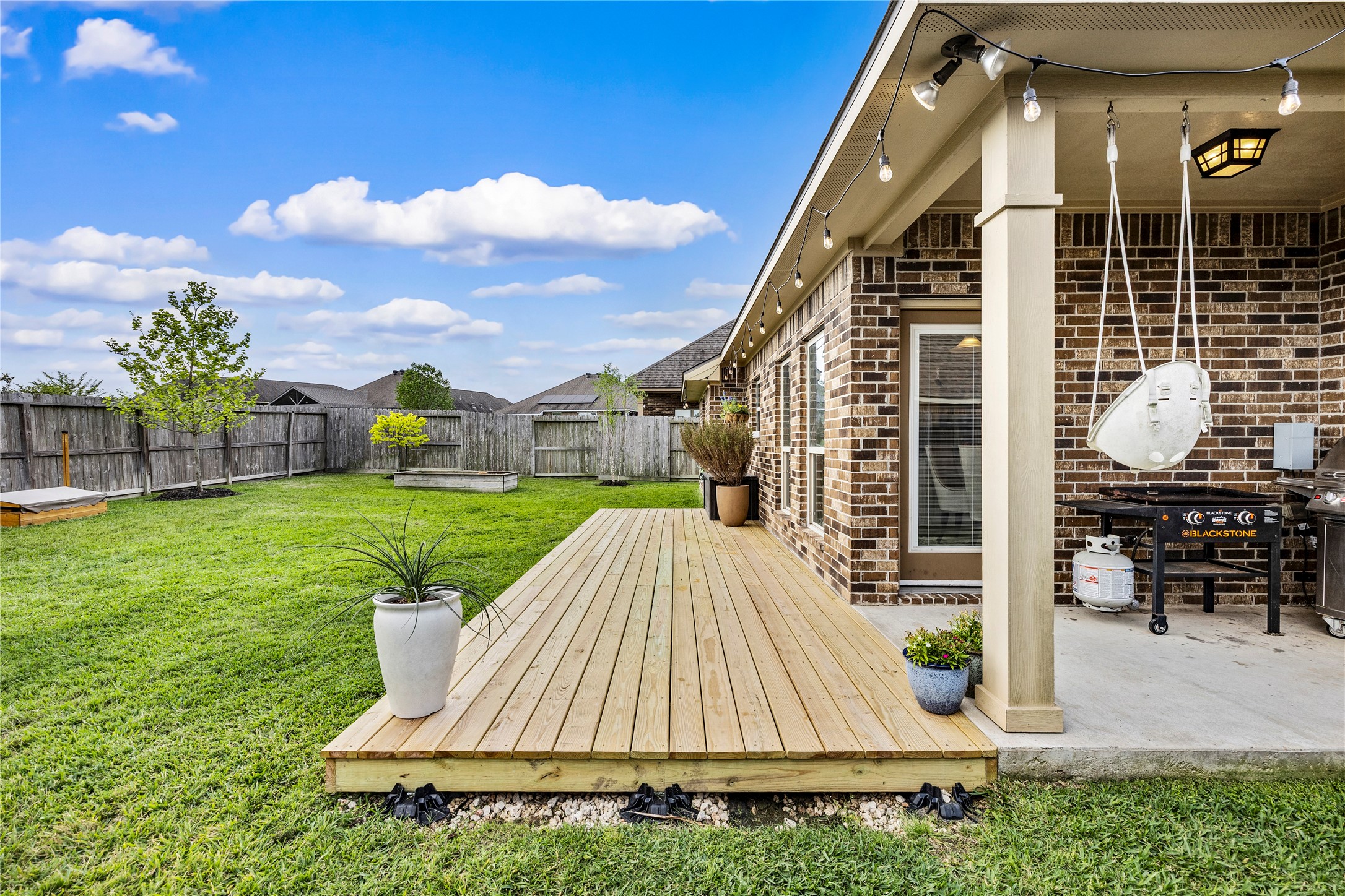 114 Dudley Road Montgomery, TX 77356 - Photo 35 of 49 Custom built wood deck to give added entertaining space.