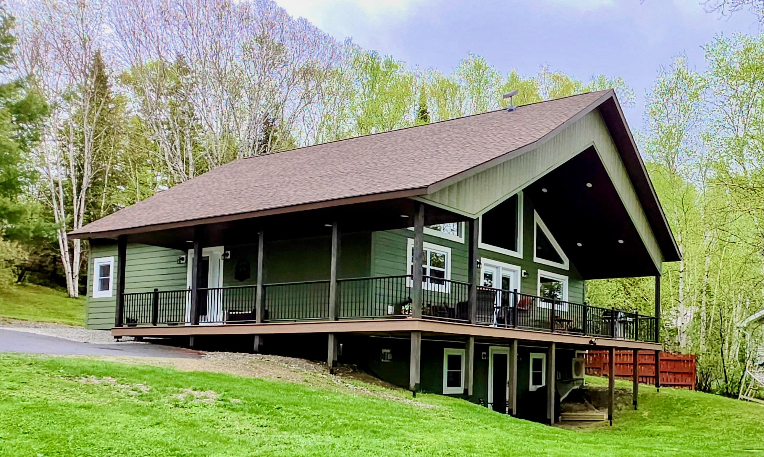 1497 Sly Brook Road Eagle Lake, ME 04739 - Photo 2 of 44 Main Sideview (1)