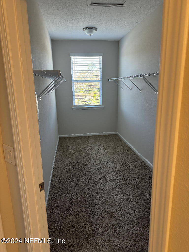 168 Pine Bluff Drive St. Augustine, FL 32092 - Photo 7 of 12 a view of an empty room with a window