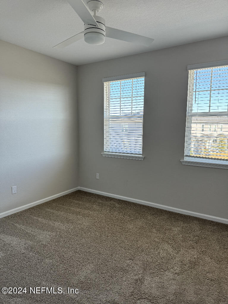 168 Pine Bluff Drive St. Augustine, FL 32092 - Photo 9 of 12 an empty room with a window