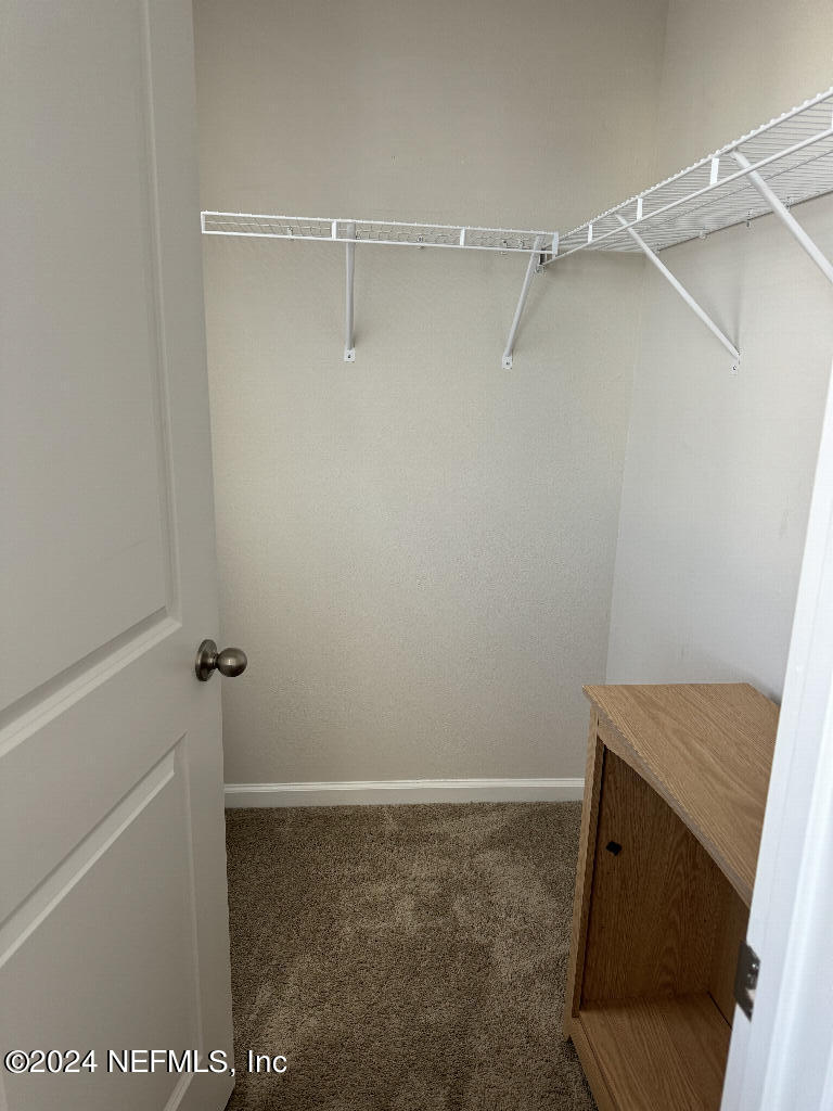168 Pine Bluff Drive St. Augustine, FL 32092 - Photo 10 of 12 a view of walk in closet