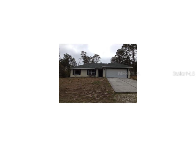 7063 Orinoco Road Weeki Wachee, FL 34613 - Photo 1 of 1 a picture of a bench in a backyard