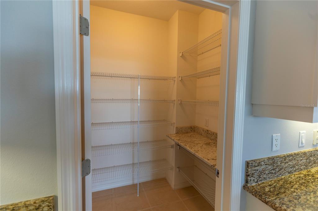 9203 Griggs Road, Unit B102 Englewood, FL 34224 - Photo 18 of 66 a bathroom with a shower