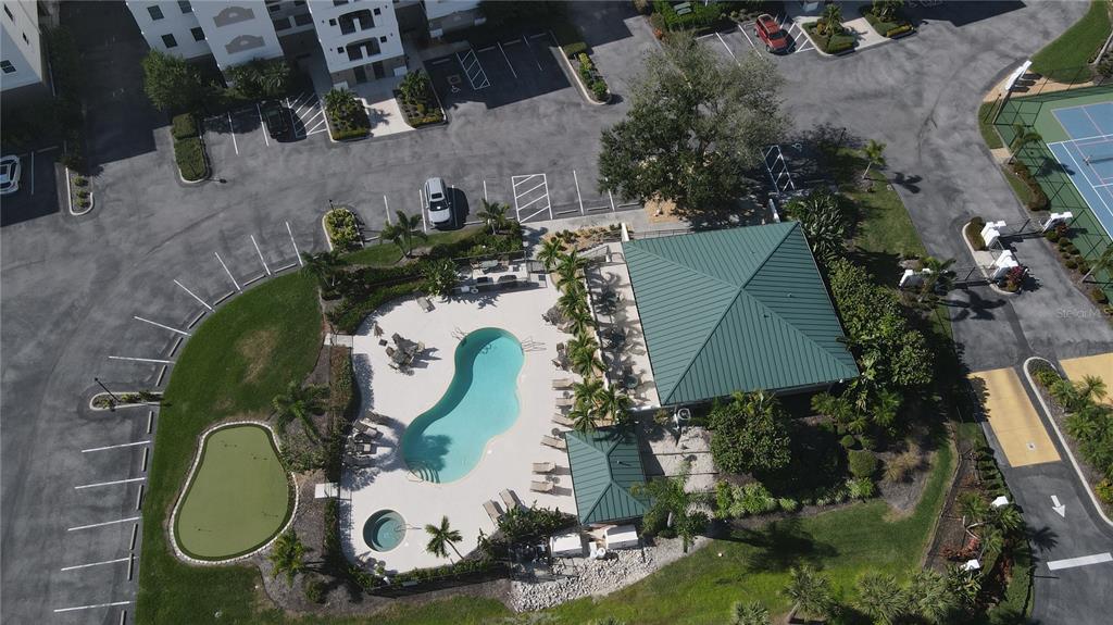 9203 Griggs Road, Unit B102 Englewood, FL 34224 - Photo 39 of 66 an aerial view of a swimming pool