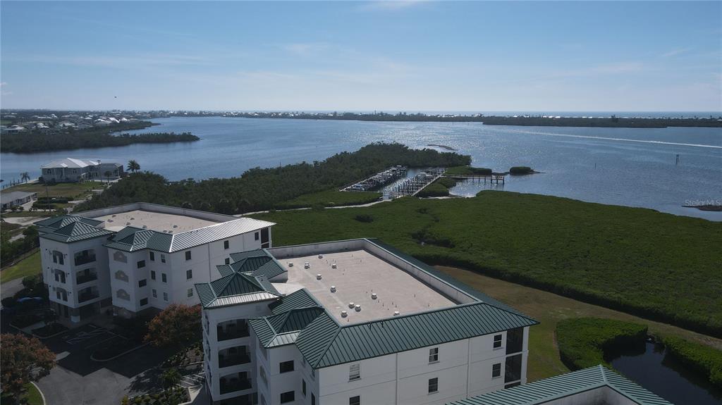 9203 Griggs Road, Unit B102 Englewood, FL 34224 - Photo 51 of 66 a aerial view of a house with lake view