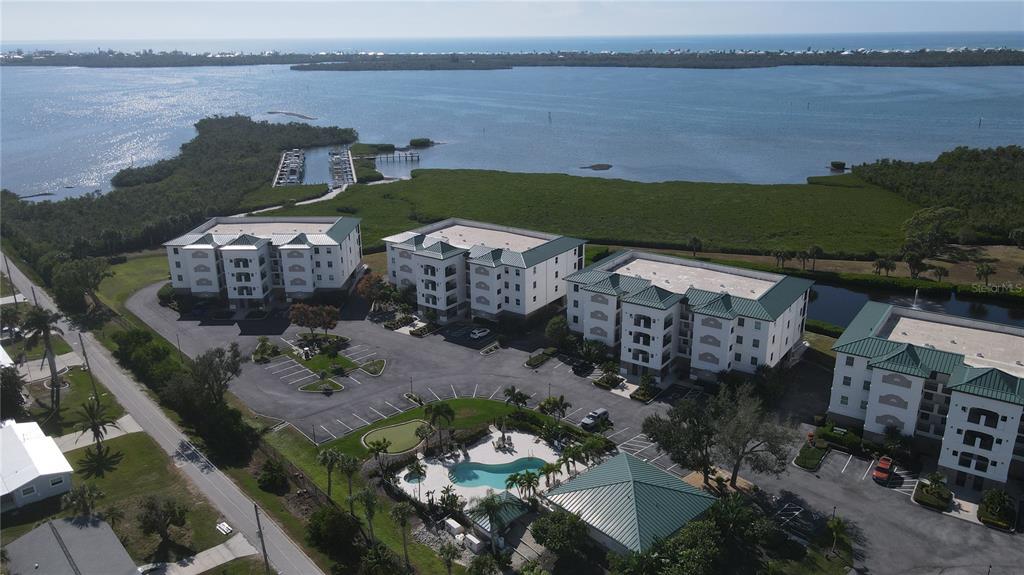 9203 Griggs Road, Unit B102 Englewood, FL 34224 - Photo 66 of 66 an aerial view of a house with a lake view