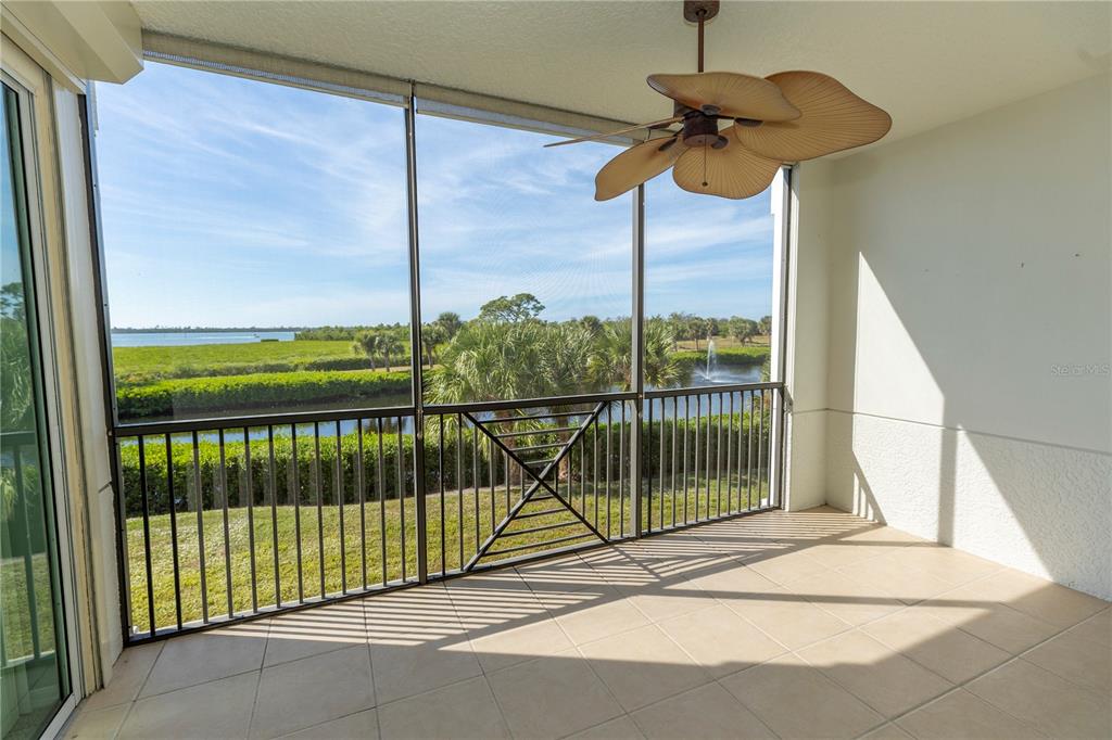 9203 Griggs Road, Unit B102 Englewood, FL 34224 - Photo 8 of 66 a view of a balcony with staircase