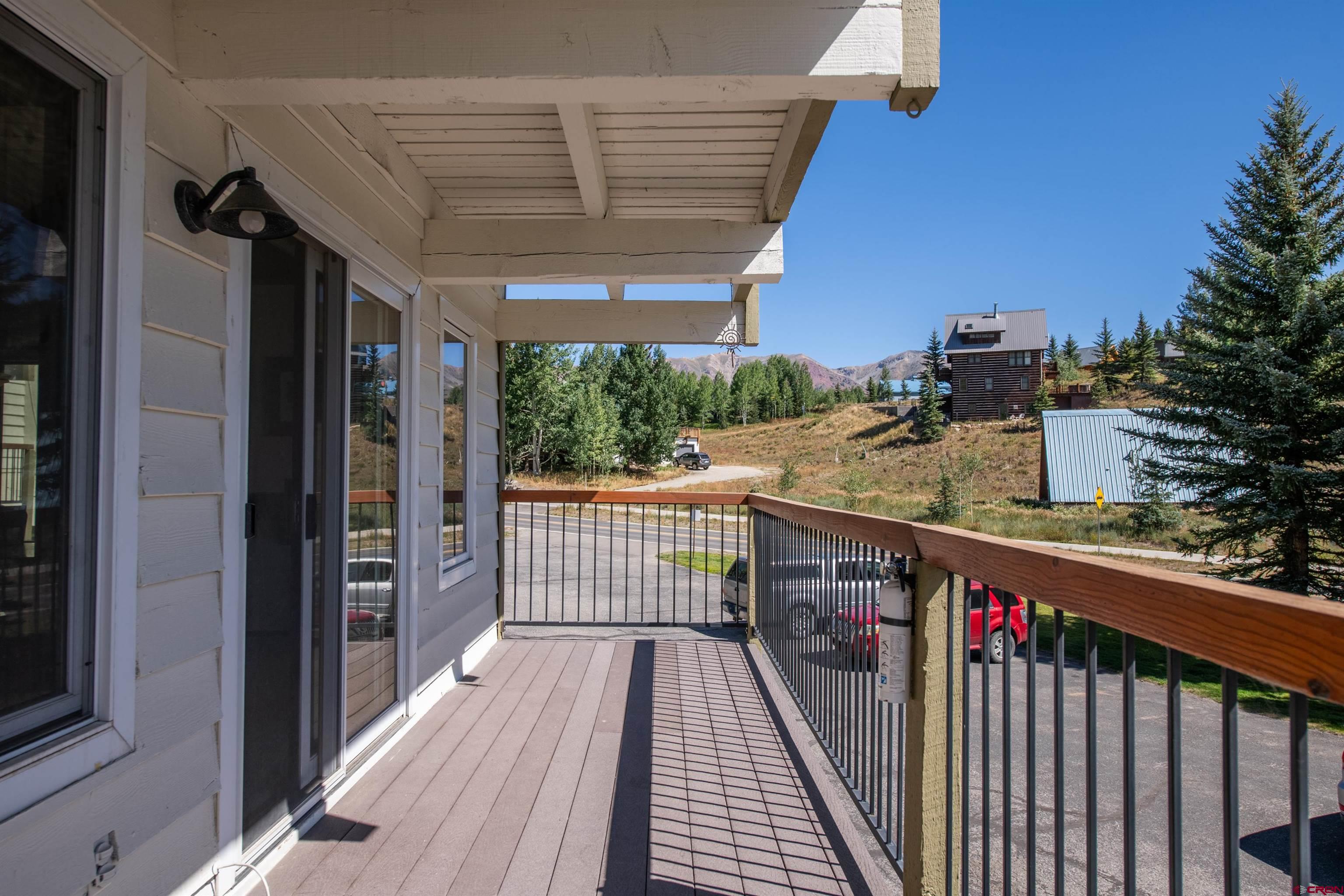 721 Gothic Road, Unit C3 Crested Butte, CO 81225 - Photo 20 of 33 a view of a balcony with wooden floor
