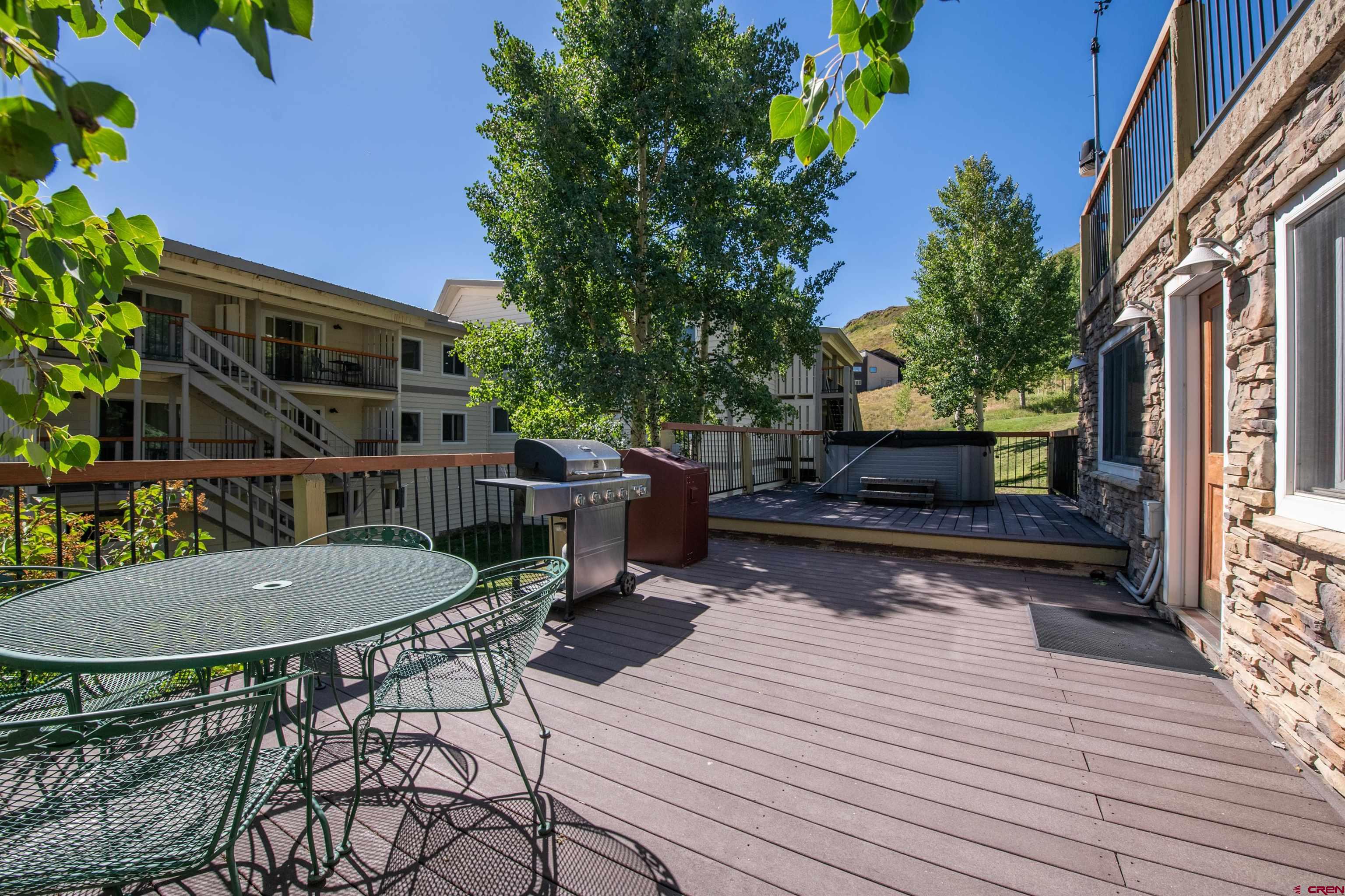 721 Gothic Road, Unit C3 Crested Butte, CO 81225 - Photo 21 of 33 a view of a chairs and tables in the balcony