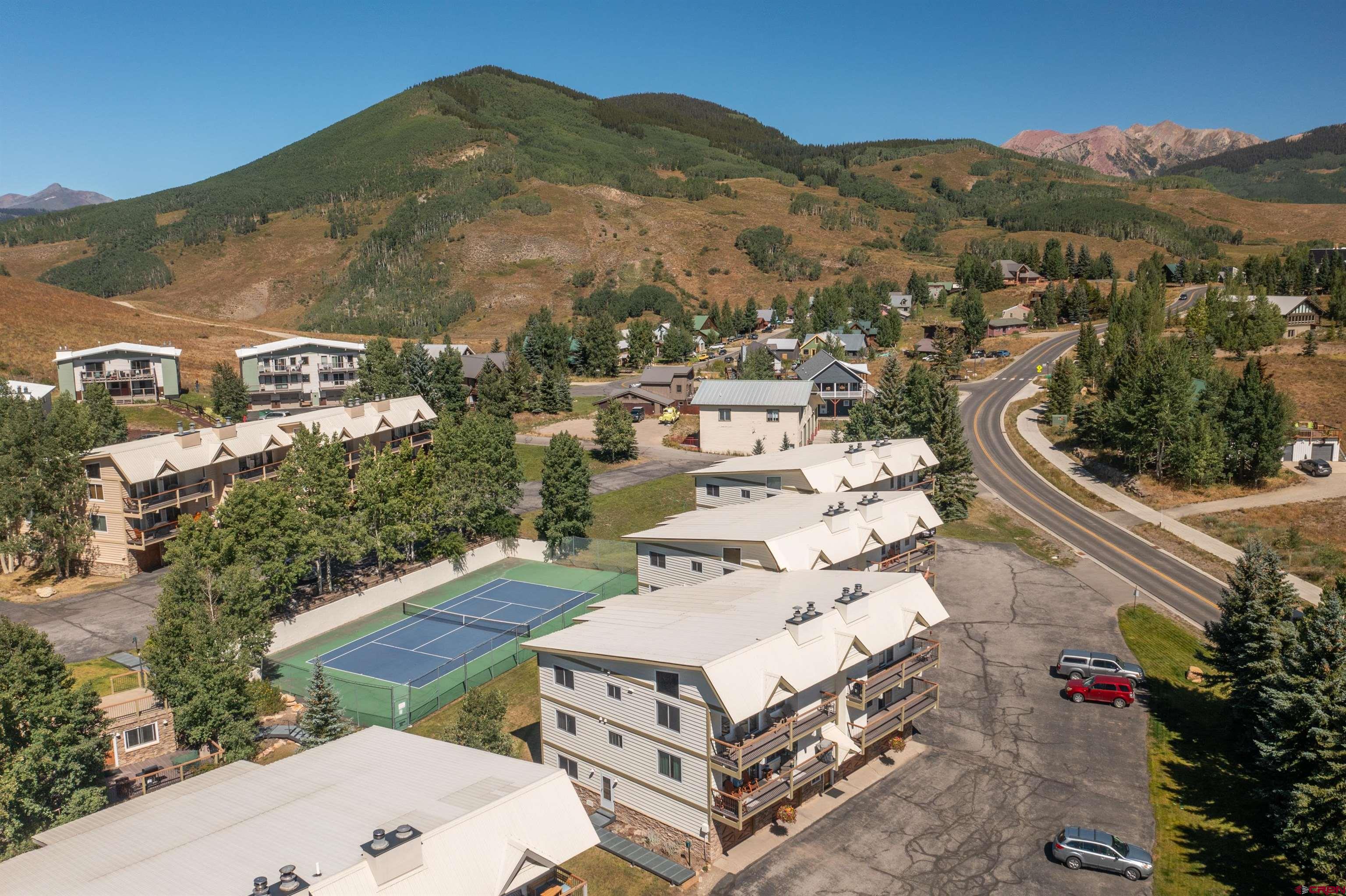 721 Gothic Road, Unit C3 Crested Butte, CO 81225 - Photo 31 of 33 an aerial view of a house with a yard