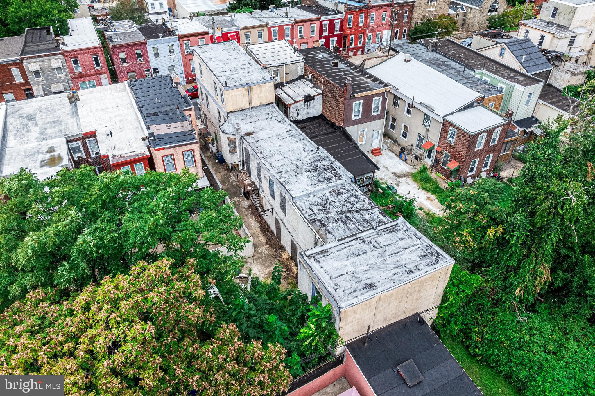 3533 North 6th Street Philadelphia, PA 19140 - Photo 30 of 31 an aerial view of a house with a yard and potted plants