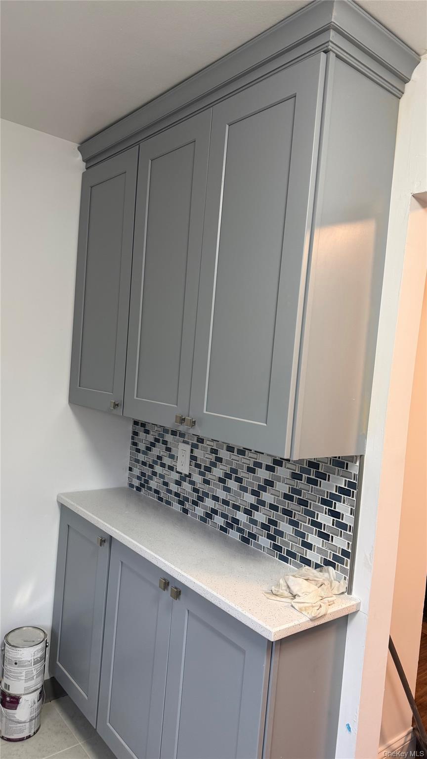 1003 Rottkamp Street, Unit 1 Valley Stream, NY 11580 - Photo 2 of 16 a bathroom with a sink and a toilet