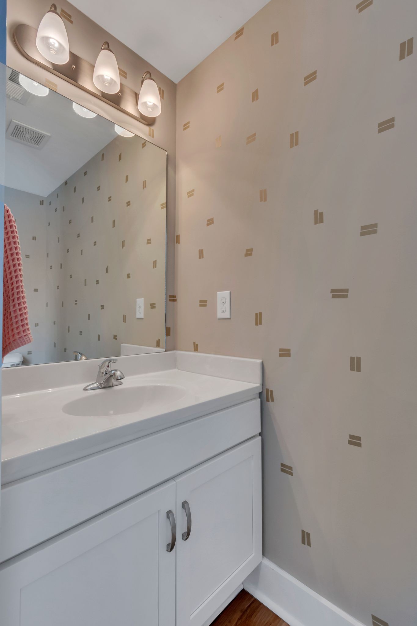 4004 Currant Court Spring Hill, TN 37174 - Photo 13 of 27 a bathroom with a sink and a mirror