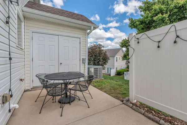 a view of a backyard of the house