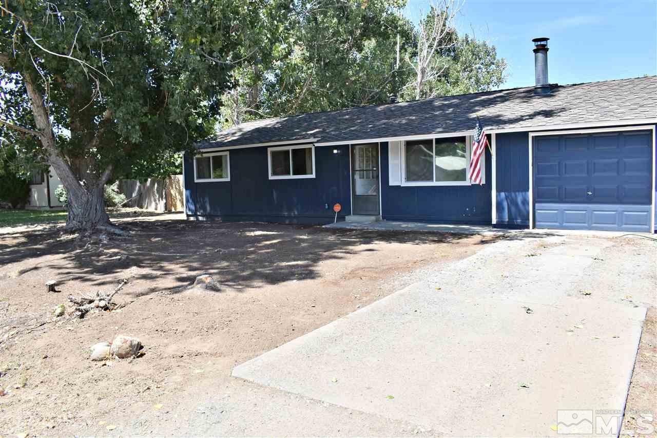 9185 Fremont Way Reno, NV 89506 - Photo 2 of 10 a view of a house with a snow in the yard
