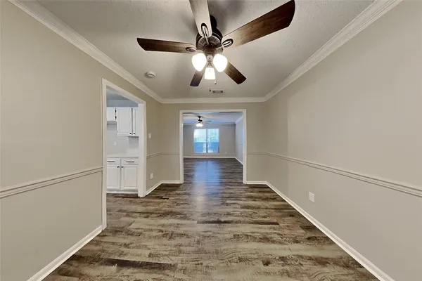 a view of an empty room and window