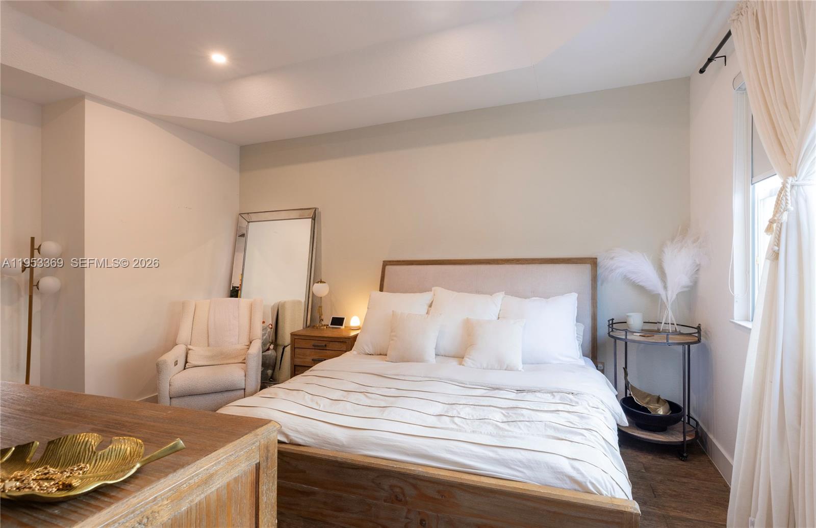 13276 Southwest 128th Street Miami, FL 33186 - Photo 17 of 43 a bedroom with a bed and a wooden floor