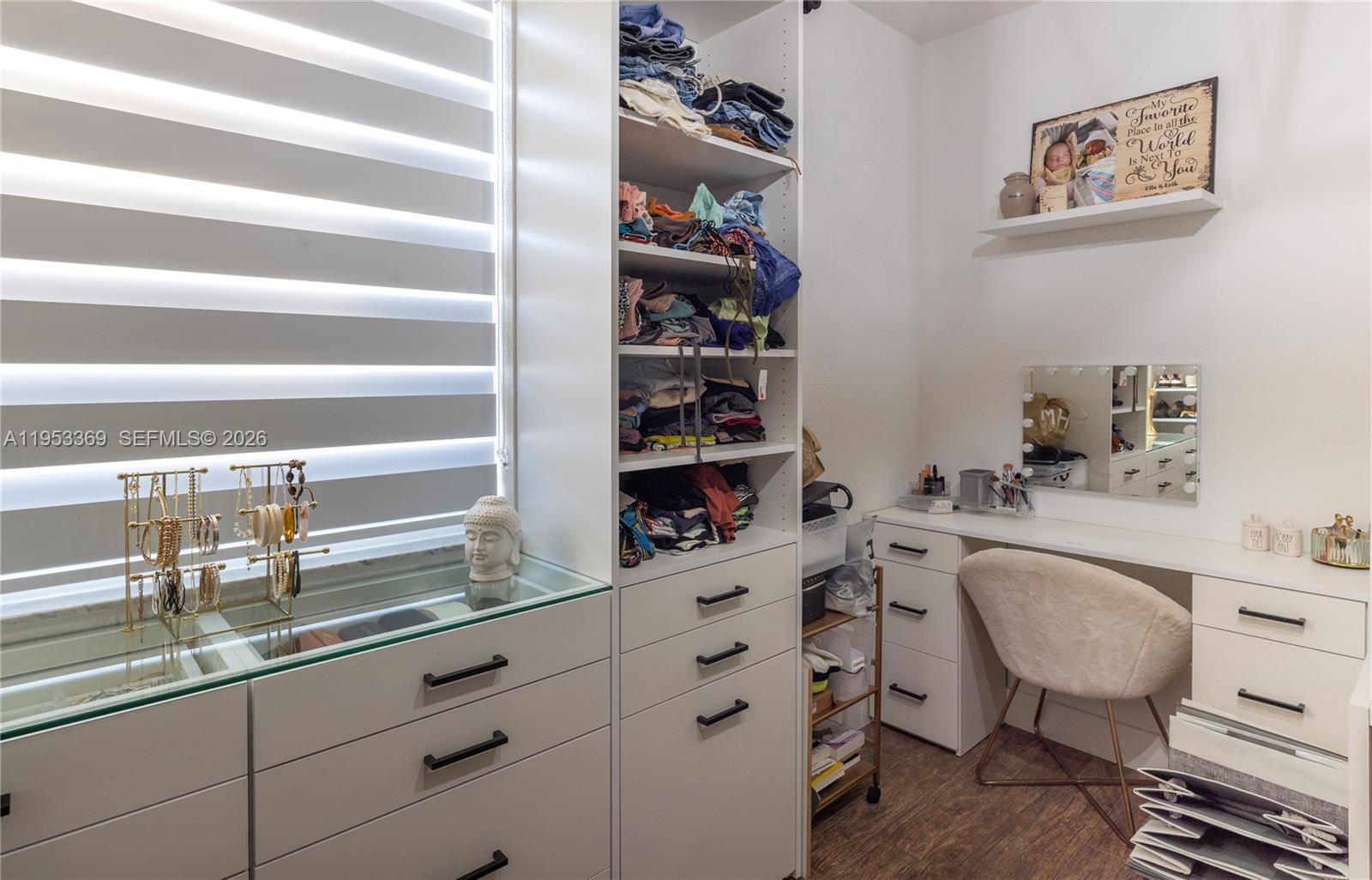 13276 Southwest 128th Street Miami, FL 33186 - Photo 21 of 43 a kitchen with a sink a stove and a bookshelf