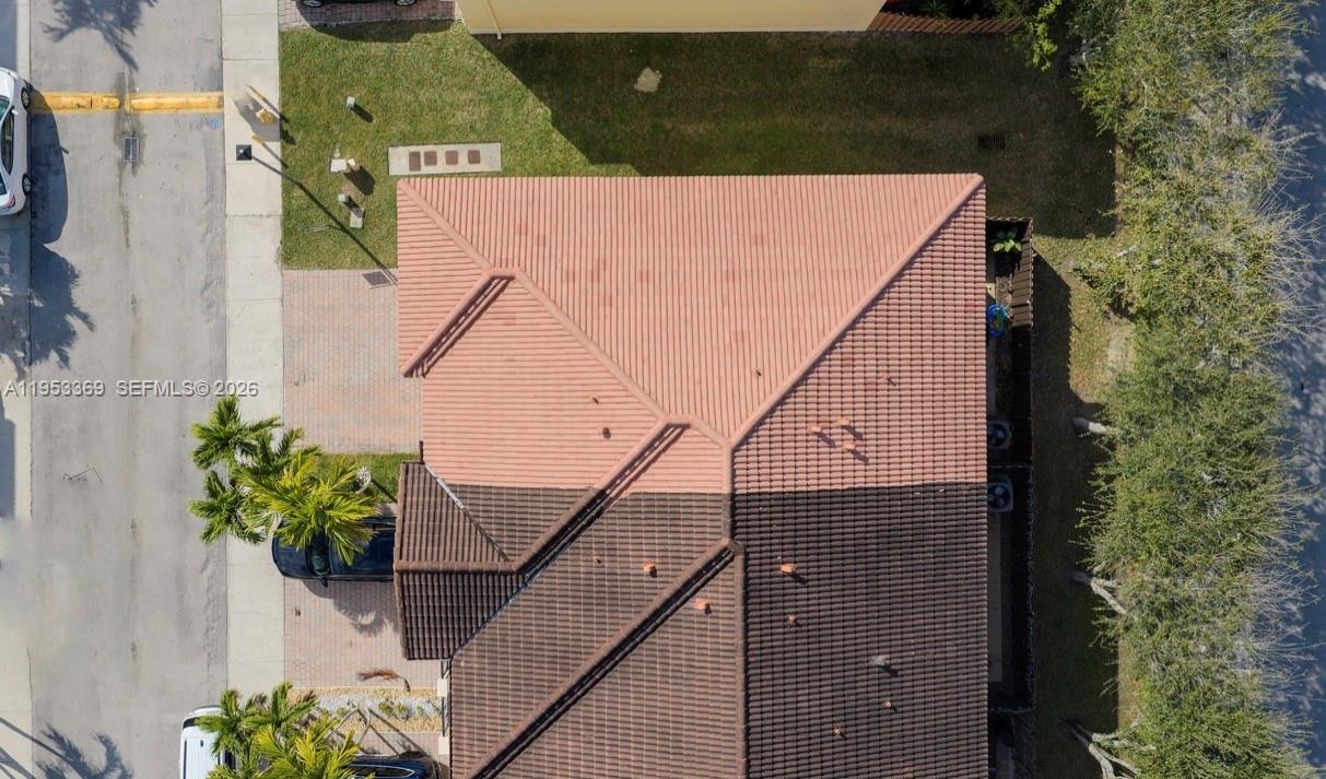 13276 Southwest 128th Street Miami, FL 33186 - Photo 35 of 43 an aerial view of a house with a garden