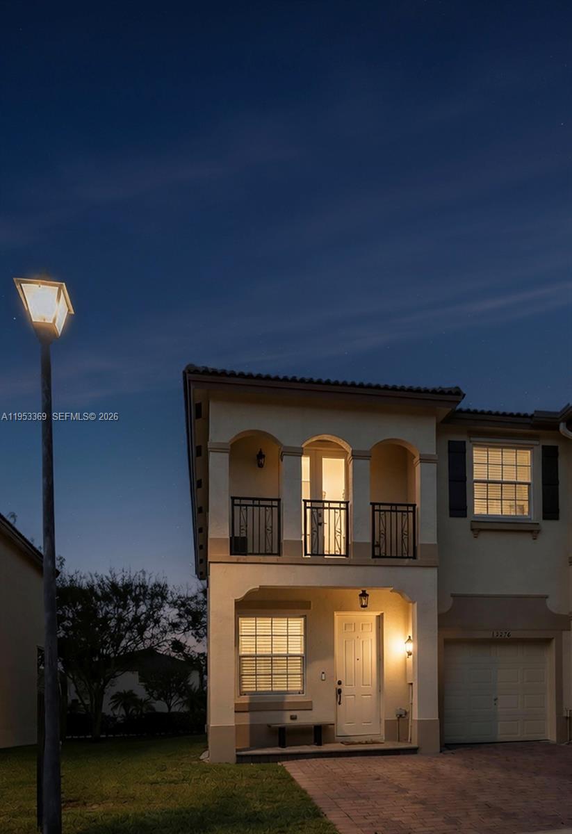 13276 Southwest 128th Street Miami, FL 33186 - Photo 43 of 43 a view of a living room that has a lot of windows and plants