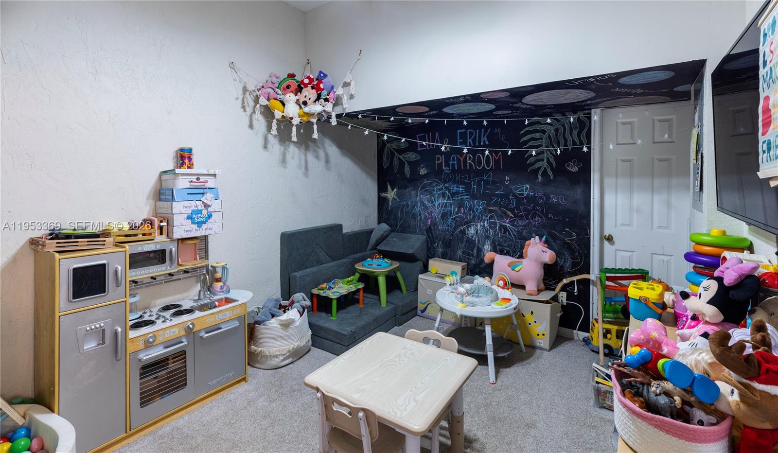13276 Southwest 128th Street Miami, FL 33186 - Photo 7 of 43 a room with furniture and toys
