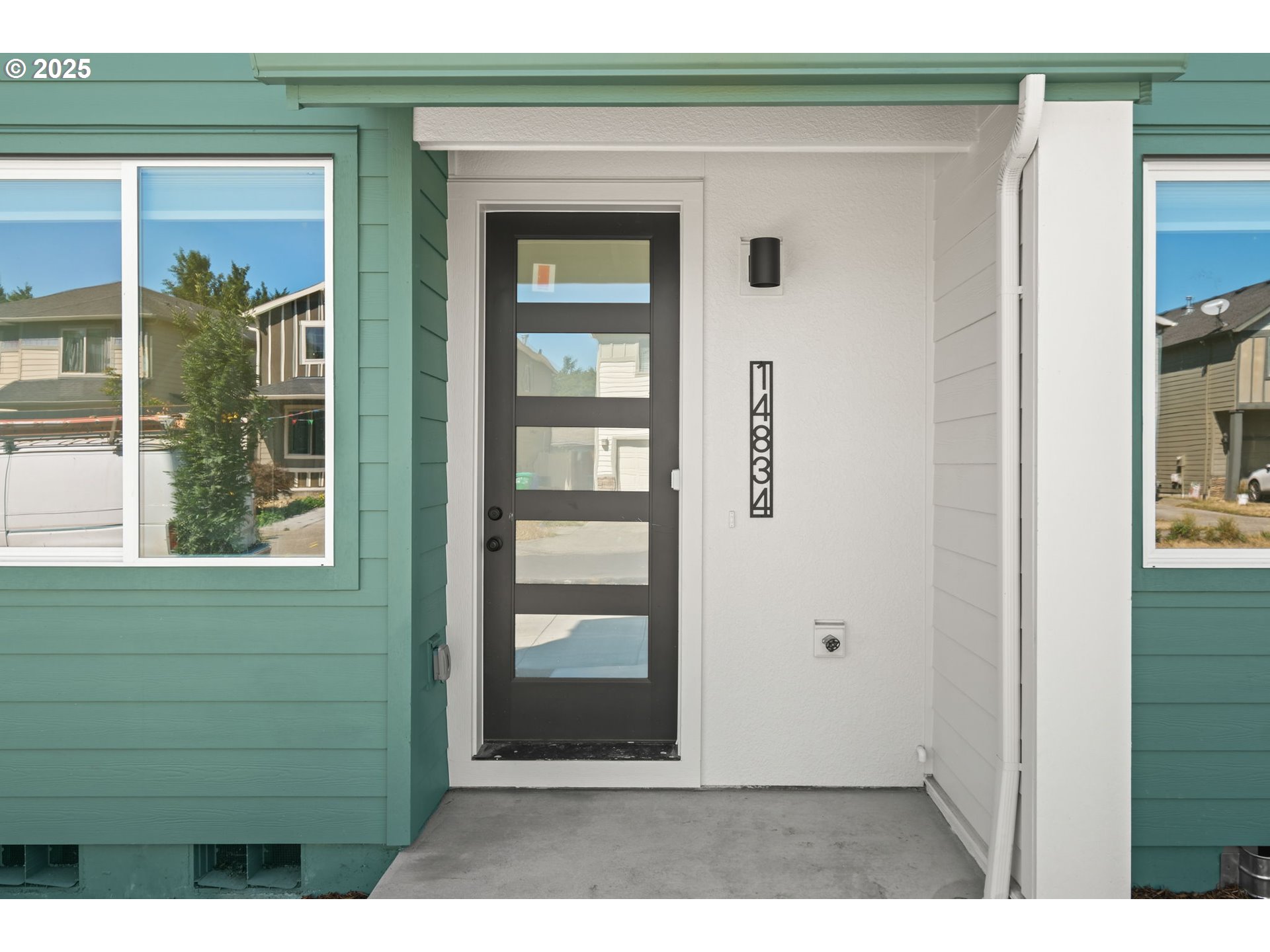 a view of a door and a window