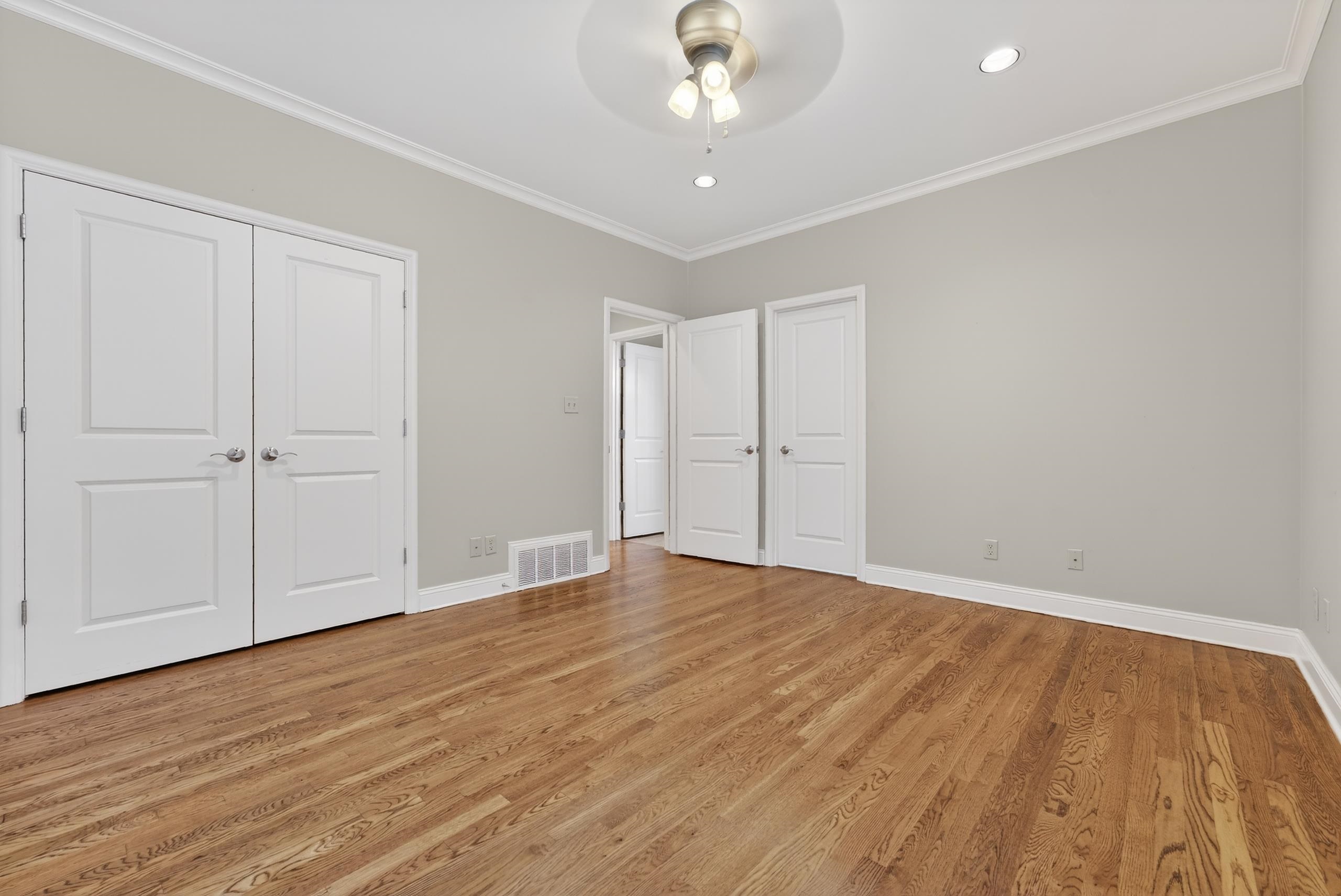 1944 Laurel Lane Collierville, TN 38139 - Photo 19 of 30 a view of empty room with wooden floor
