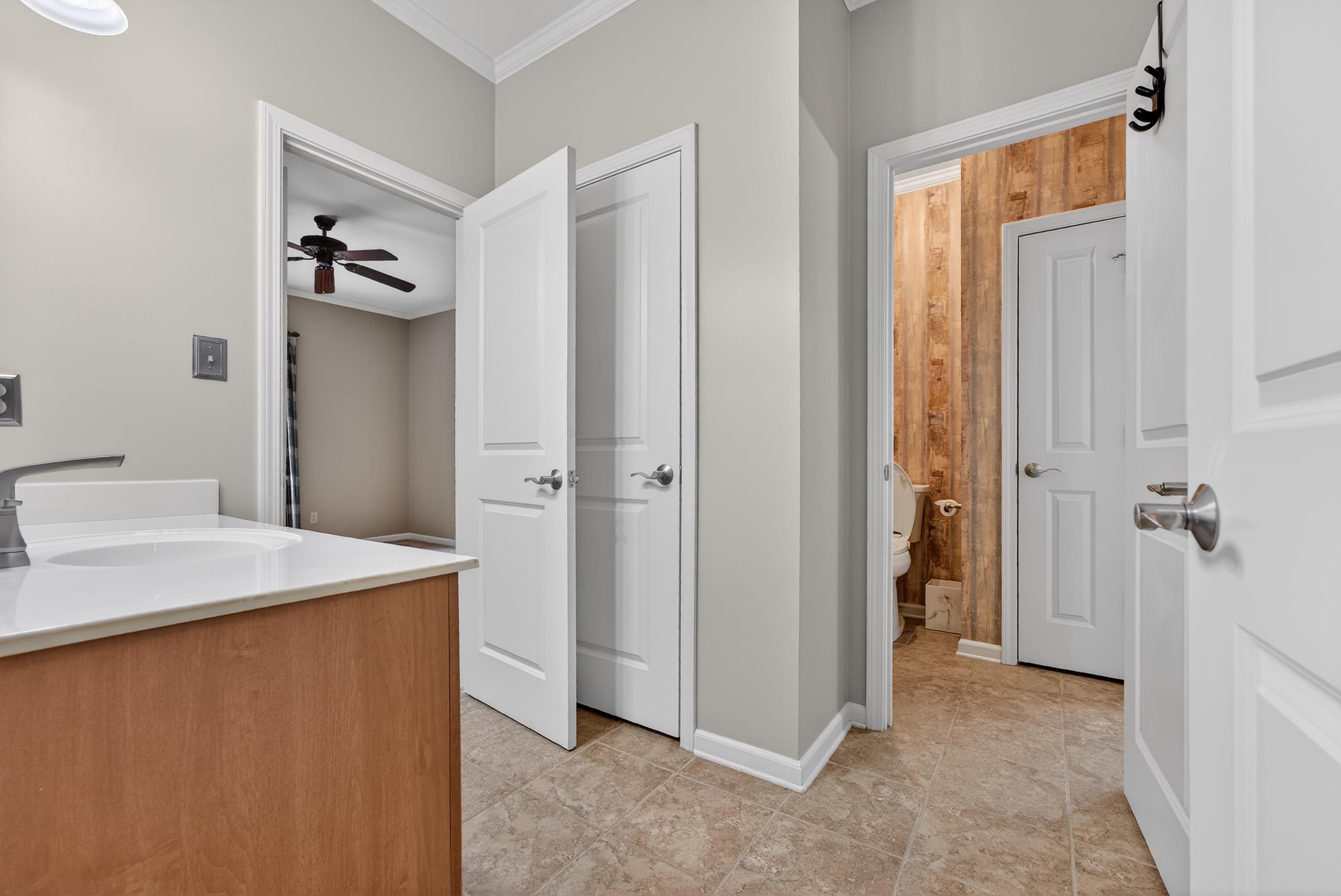 1944 Laurel Lane Collierville, TN 38139 - Photo 26 of 30 a view of a bathroom with a sink and a mirror