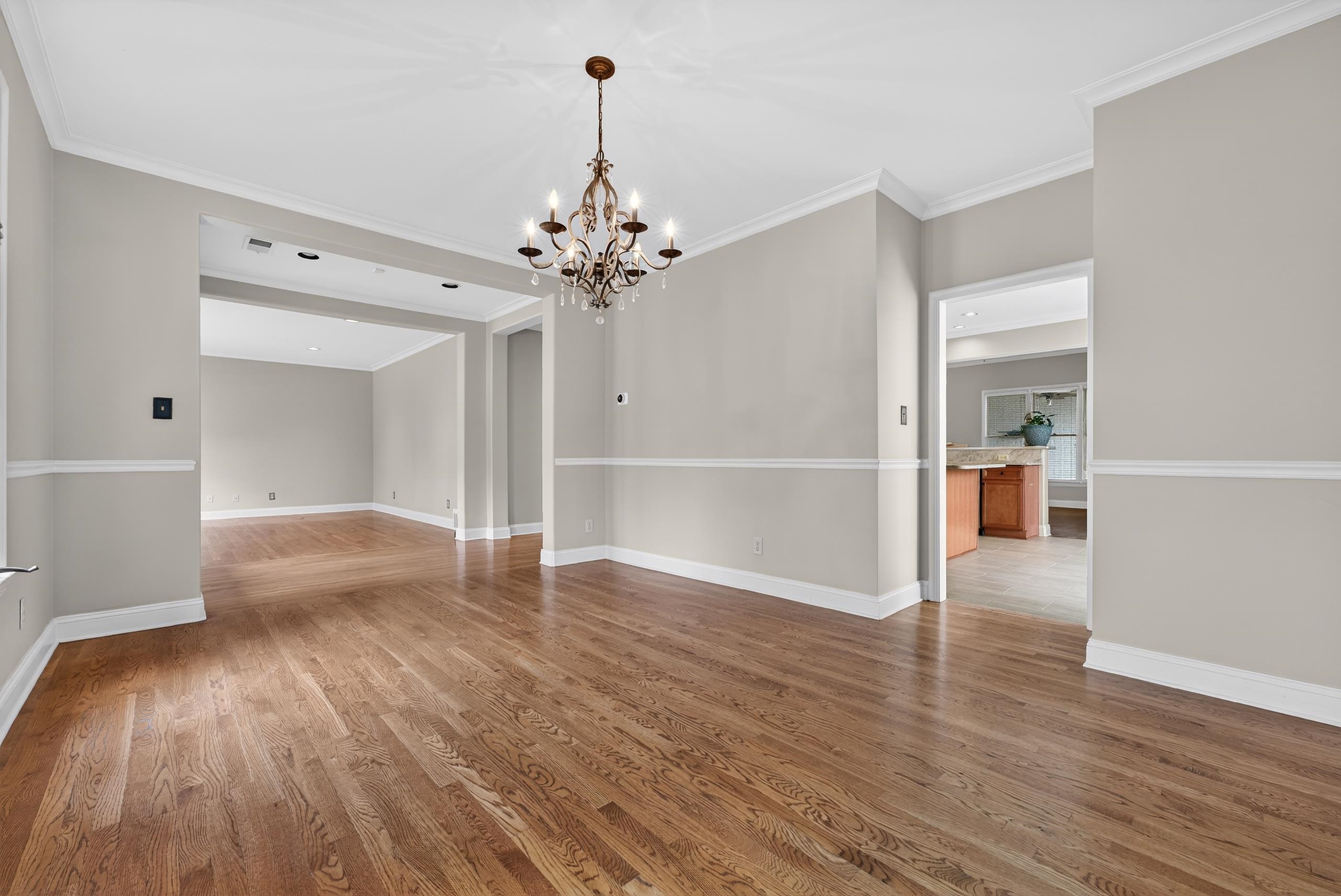 1944 Laurel Lane Collierville, TN 38139 - Photo 4 of 30 wooden floor in an empty room with a window