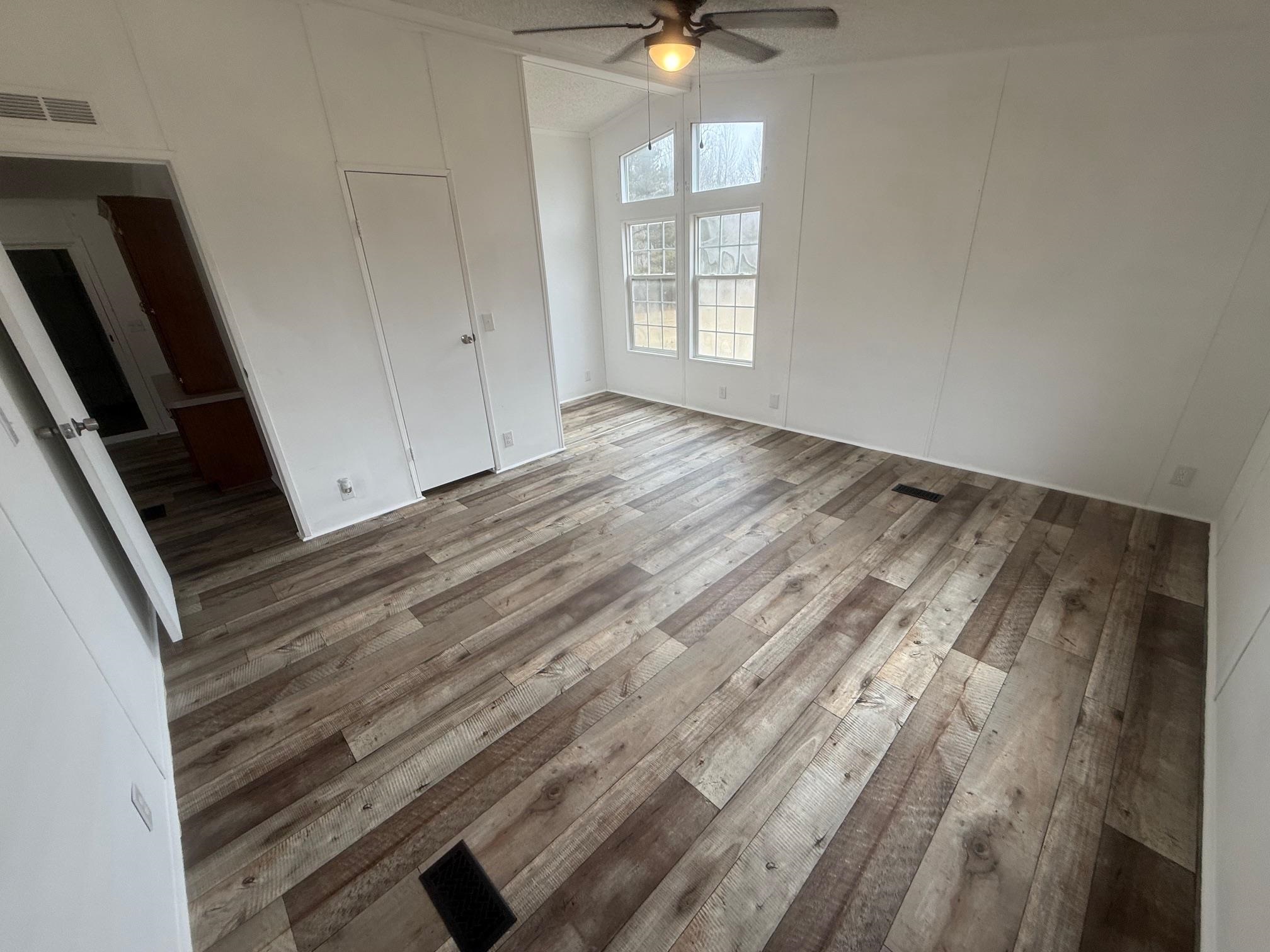 1688 Hardin Graveyard Road Adamsville, TN 38310 - Photo 14 of 40 a view of an empty room with a window
