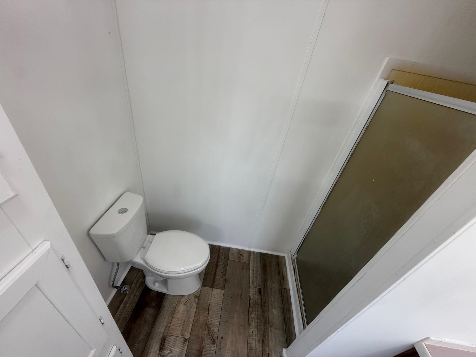 1688 Hardin Graveyard Road Adamsville, TN 38310 - Photo 16 of 40 a bathroom with a toilet and a sink