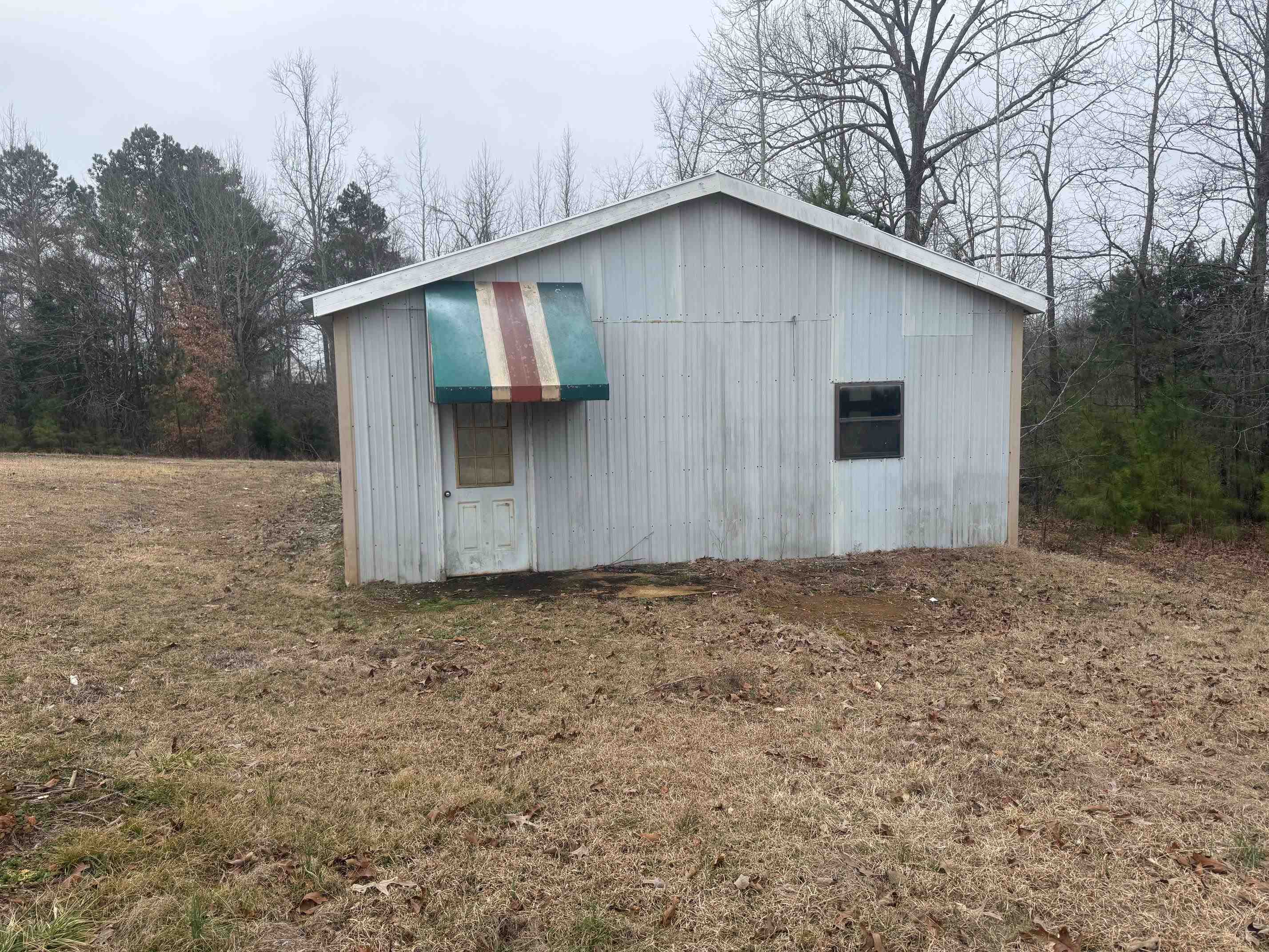 1688 Hardin Graveyard Road Adamsville, TN 38310 - Photo 26 of 40 a house with a yard