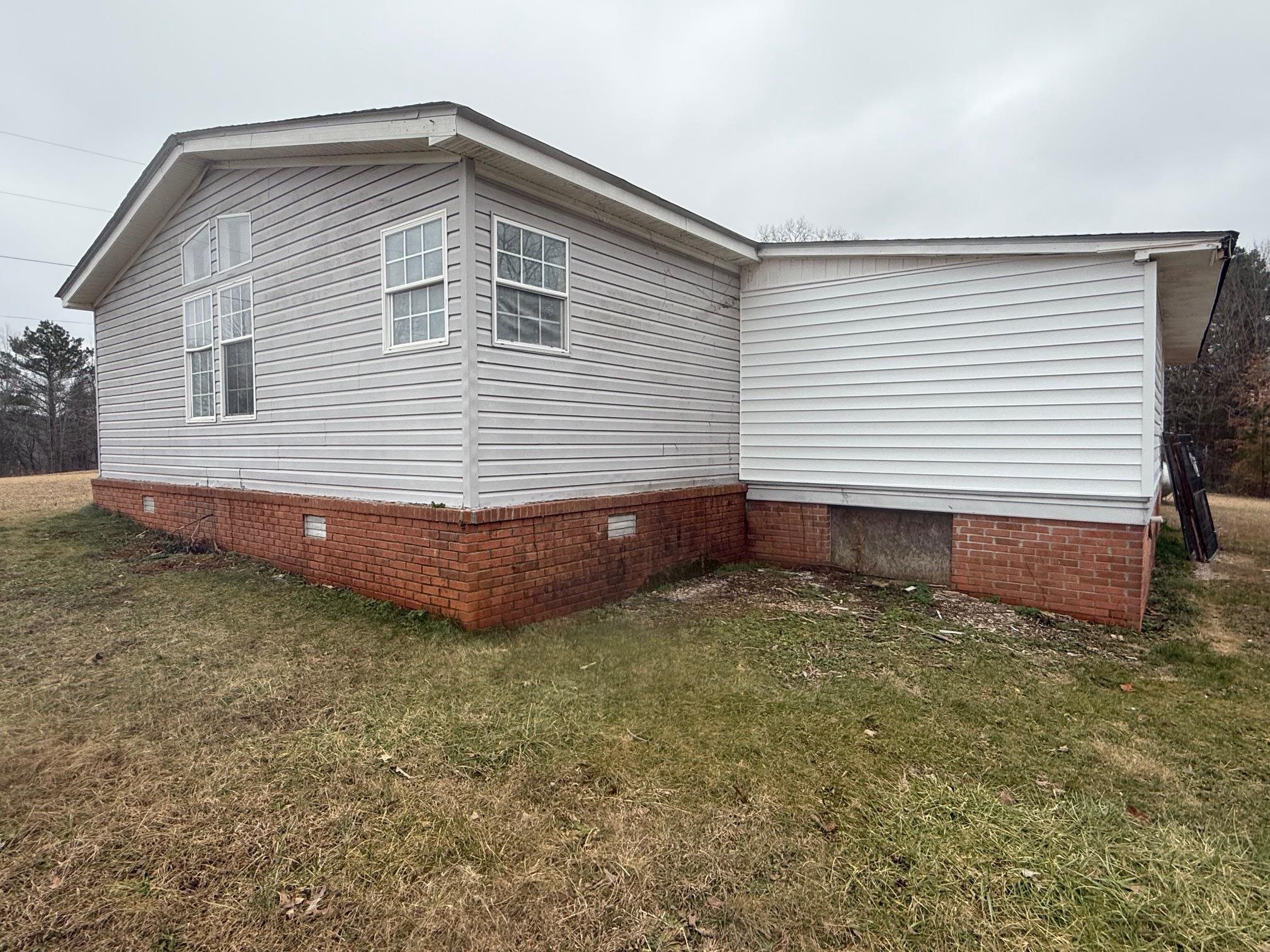 1688 Hardin Graveyard Road Adamsville, TN 38310 - Photo 30 of 40 a backyard of a house