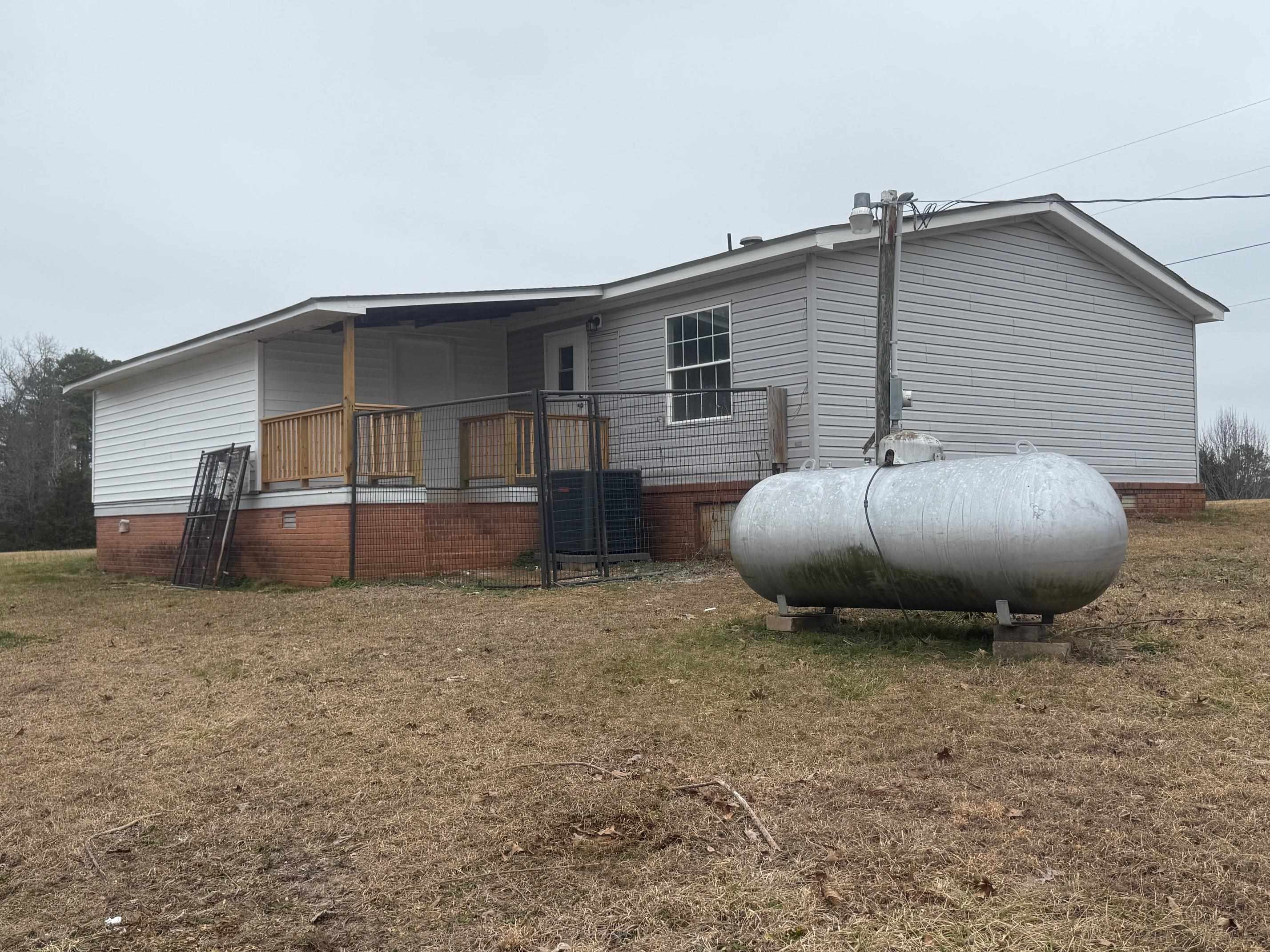 1688 Hardin Graveyard Road Adamsville, TN 38310 - Photo 31 of 40 a view of a house with backyard